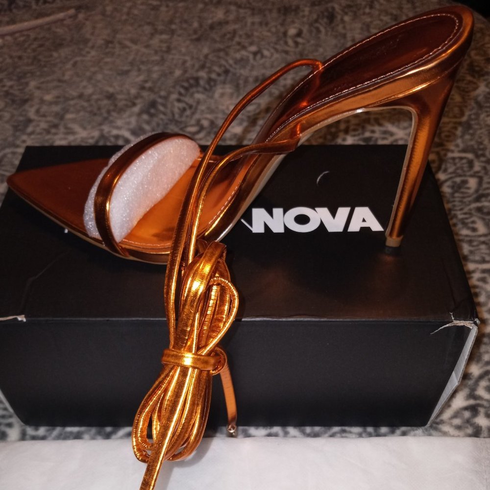 Metallic orange strappy high heels